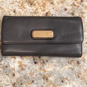 Marc by Marc Jacobs wallet Napa leather I believe.  Excellent used condition.